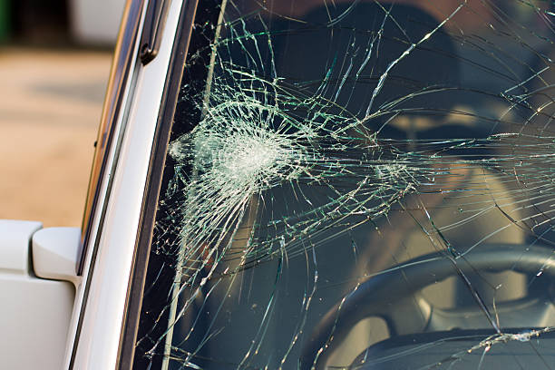 web of splits on the triplex windscreen.