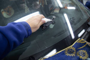 Repair of chips and cracks on the windshield of the car.